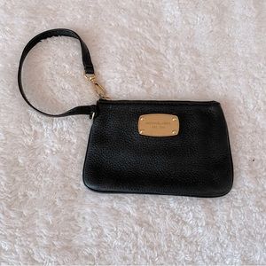 Michael Kors black leather women’s travel zip wristlet